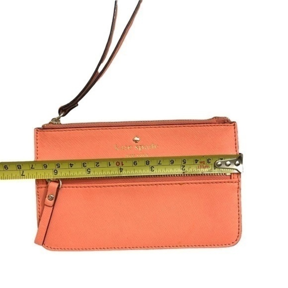 Kate spade peach saffiano leather wristlet bag
